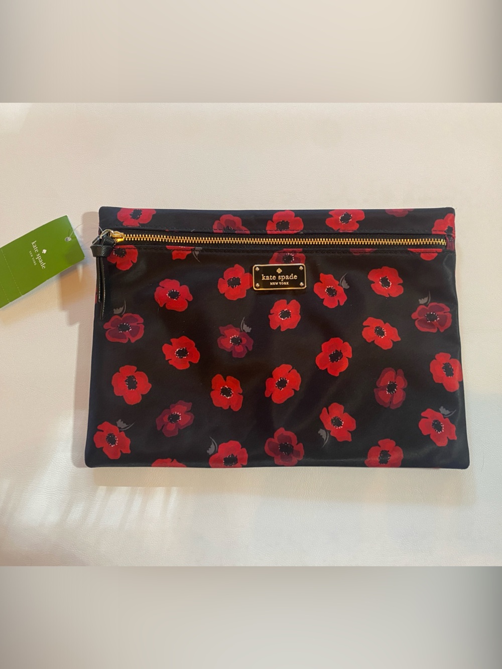 kate spade Black Poppy Print Zip Clutch with Gold Hardware